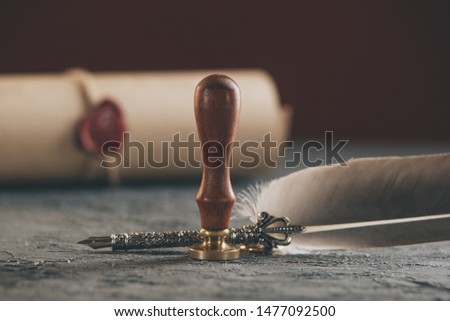 Notary's public pen and stamp on testament and last will. Notary public