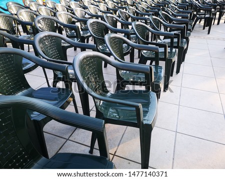Vacant empty plastic chairs pattern