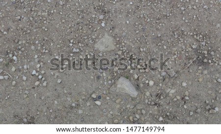 sidewalk in the village made of rubble and sand
