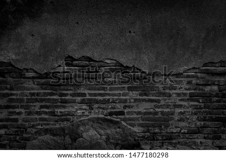 Black brick wall and concrete texture for background. Royalty-Free Stock Photo #1477180298