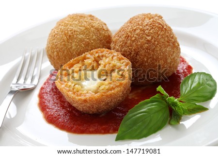 arancini, fried rice balls, italian cuisine Royalty-Free Stock Photo #147719081