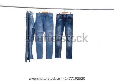 Denim four blue Jeans on hanger

