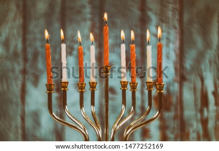jewish holiday Hanukkah with menorah traditional Candelabra top retro