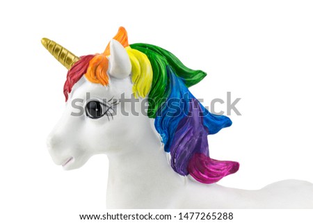The left side of the unicorn is covered with white background. Trend. Minimalism. Lifestyle.