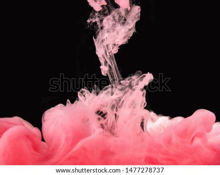 Acrylic cloud dissolving into water, isolated on black background, close up view. Acrylic smoke underwater. Drop of ink in liquid. Abstract background for overlays design, screen blending mode layer