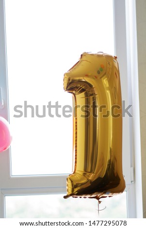 Yellow number 1 balloon for interior or event decoration.Balloons with happy celebration.Concept of happiness, joy, Love, birthday, wedding