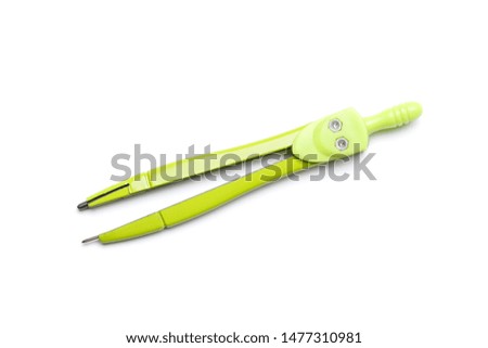 Green stationery compass isolated on a white background.