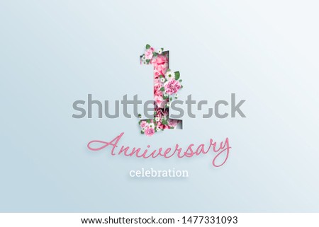 Creative background, the inscription 1 number and anniversary celebration textis flowers, on a light background. Concept birthday, celebration event, template, flyer.
