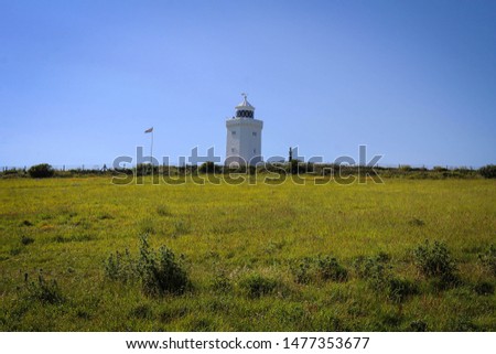 Scenic view of lighthouse at White Cliffs near Dover, England