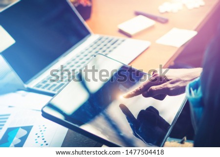 Online business working in professional office with digital smartphone, computer, powerpoint graph presentation. Sign future contract and connect with client using technology