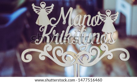 "Mano krikstynos" sign - "My christening celebration" in Lithuanian