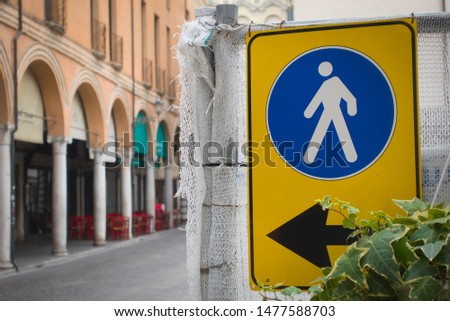 Traffic sign in the city for pedestrians: pedestrians on the left, here construction work