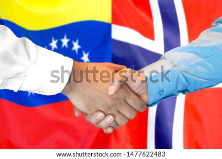 Business handshake on the background of two flags. Men handshake on the background of the Venezuela and Norway flag. Support concept