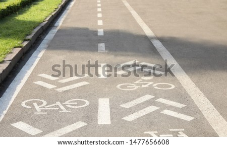 Bicycle lane with marking on asphalt road