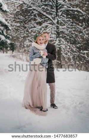 Winter wedding in a snowy forest