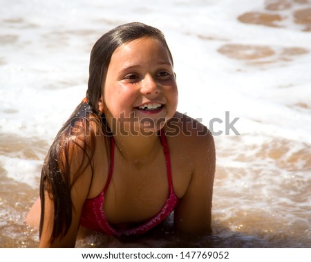 little girl portrait on the beach