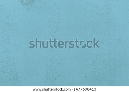 Blue cardboard texture close-up. Dark old paper background. Grunge concrete wall. Vintage blank wallpaper.
