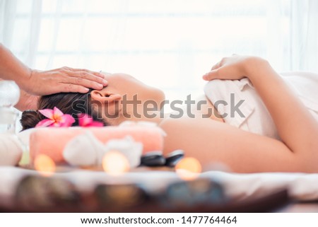 Spa and massage concept, Close up  of Asian woman  Relaxing for facial and head massage spa treatment