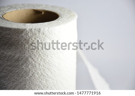 White toilet paper with gray background