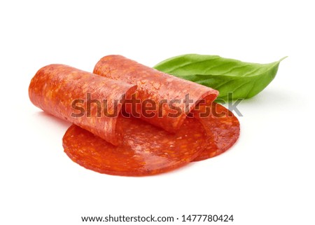 Chorizo sausage slices, Traditional spanish sausage, isolated on white background.