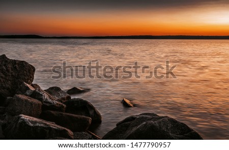 Mindemoya Lake rocky shore on a spectacular sunset