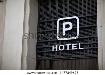 Car illuminated parking sign of a hotel with copy space