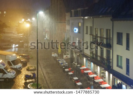 Rain in the Brussels. View of the Brussels street at night summer time. High resolution photo.