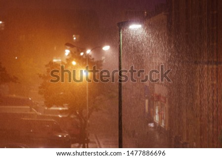 Cold rain in the Brussels. View of the Brussels street at night summer time. High resolution photo.