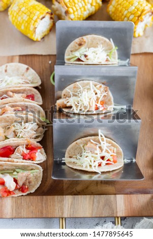 mini tacos, quesadillas, and corn on the cob, wooden tray, finger foods, kids dinner