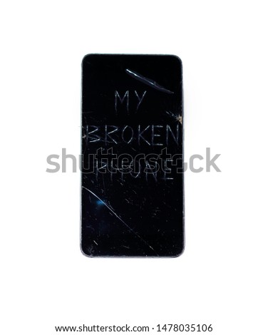 Broken smartphone on white background