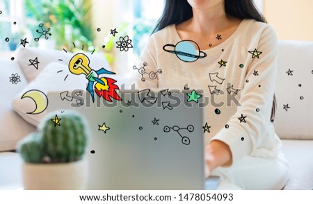 Idea rocket with woman using her laptop in her home office