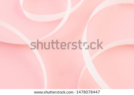 Abstract white ribbon on pink background isolated. - Wallpaper Image