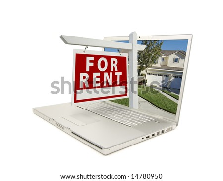 For Rent Sign & New Home on Laptop isolated on a white Background.