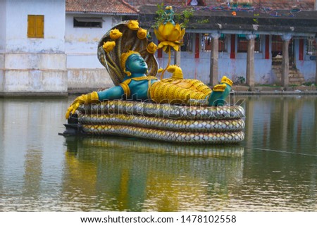 A huge plastic model of Sri Padmanabha swamy floating on padmanabha swamy temple pond