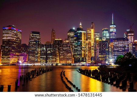 Lower Manhattan skyline at night seen from Brooklyn Bridge Park,NY,USA