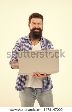 Happy man with notebook. Searching for new job. Bearded man using notebook. Bearded happy man surfing inet on notebook. Job searching. I need job. Best offer. Job search. In search of inspiration.