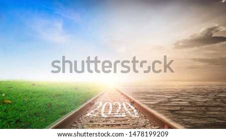 2020 Concept: 2020 on Railroad Sunset Background