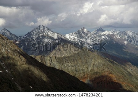 Glacier in the Altai mountains. Panoramic view to the peaks.