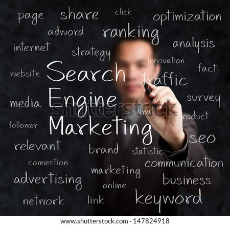 business man writing search engine marketing concept