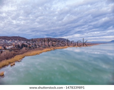 Nice clouds reflection on lake Balaton in Hungary, drone picture