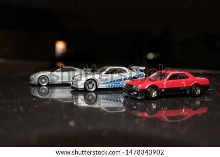 Diecast toy car with night panorama