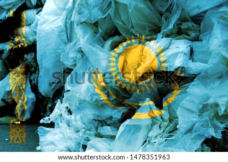 The flag Kazakhstan is shown on the trash bag. Ecology concept with environmental pollution from household and industrial waste.