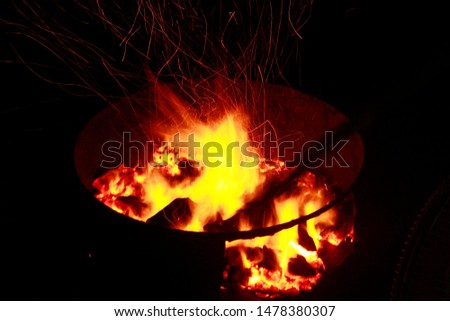 Beautiful bonfire with sparks flying upwards