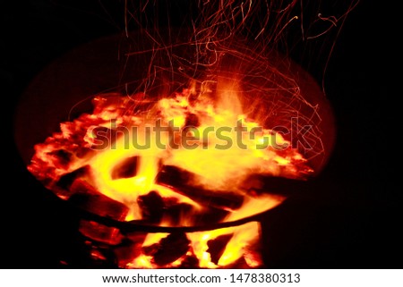 Beautiful bonfire with sparks flying upwards