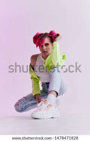 stylish young woman with pink hair studio fashion retro