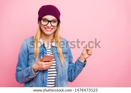 Photo of gorgeous toothy charming girlfriend pointing at your right choice after having advised you best service center while isolated with pastel background