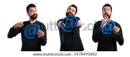 Set of Handsome man with beard holding icon of at dot com
