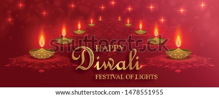 Diya lamp with fire lighting for Diwali, Deepavali or Dipavali, the indian festival of lights on color background Royalty-Free Stock Photo #1478551955