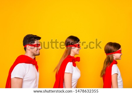 Photo of family playing cartoon characters wear superhero carnival costumes isolated yellow background