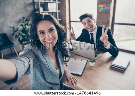 Photo of nice cheerful relaxing business people having rest during official break at their work